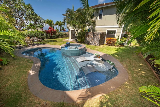 view of swimming pool with a yard, fence, and a pool with connected hot tub