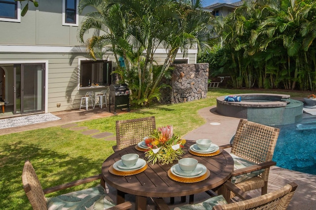 exterior space featuring an outdoor hot tub