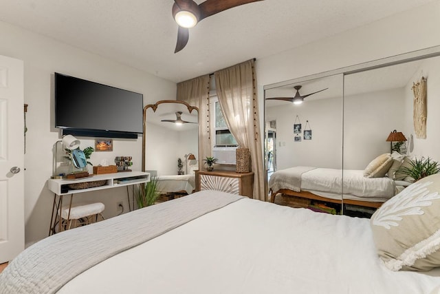 1299 Uluniu Rd Unit 103E, Kihei, HI 96753 - bedroom featuring ceiling fan and a closet