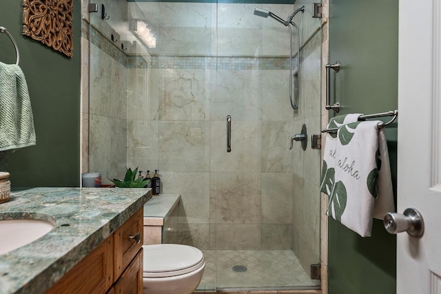 1299 Uluniu Rd Unit 103E, Kihei, HI 96753 - full bathroom with a stall shower, toilet, and vanity