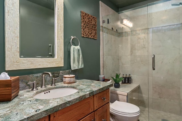 1299 Uluniu Rd Unit 103E, Kihei, HI 96753 - bathroom with a stall shower, vanity, and toilet