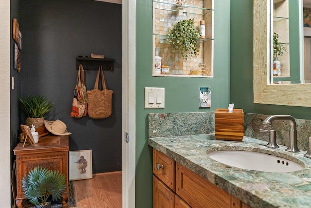 1299 Uluniu Rd Unit 103E, Kihei, HI 96753 - bathroom with wood finished floors and vanity