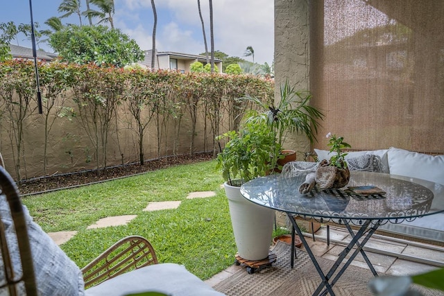 1299 Uluniu Rd Unit 103E, Kihei, HI 96753 - view of yard featuring outdoor dining space