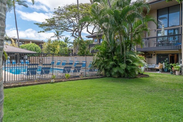 1299 Uluniu Rd Unit 103E, Kihei, HI 96753 - community pool featuring an outdoor living space