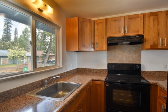 kitchen featuring sink and black electric range oven