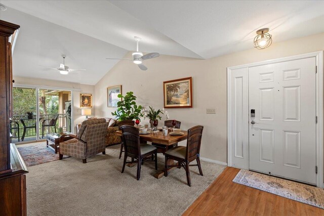 22 Kai Makani Loop Unit 201, Kihei, HI 96753 - dining space with lofted ceiling, ceiling fan, baseboards, and wood finished floors