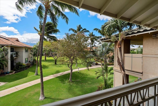 22 Kai Makani Loop Unit 201, Kihei, HI 96753 - view of grassy yard with a balcony