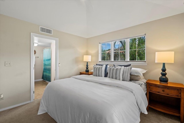 22 Kai Makani Loop Unit 201, Kihei, HI 96753 - bedroom with baseboards and light carpet