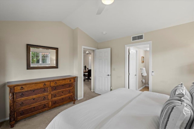 22 Kai Makani Loop Unit 201, Kihei, HI 96753 - bedroom featuring light colored carpet, vaulted ceiling, a ceiling fan, baseboards, and ensuite bathroom