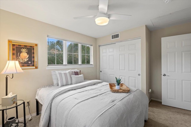 22 Kai Makani Loop Unit 201, Kihei, HI 96753 - carpeted bedroom featuring a closet, baseboards, ceiling fan, and attic access