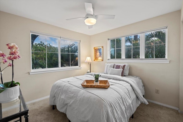 22 Kai Makani Loop Unit 201, Kihei, HI 96753 - bedroom with carpet floors, baseboards, and ceiling fan