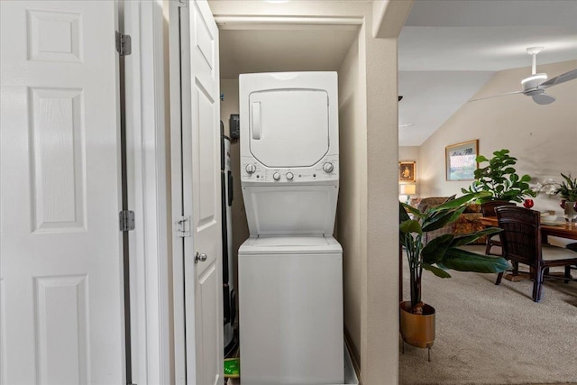 22 Kai Makani Loop Unit 201, Kihei, HI 96753 - laundry room featuring stacked washer and clothes dryer, carpet, and a ceiling fan