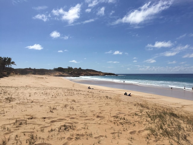 property view of water featuring a view of the beach