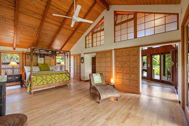 bedroom with ceiling fan, beam ceiling, high vaulted ceiling, wooden ceiling, and light hardwood / wood-style floors