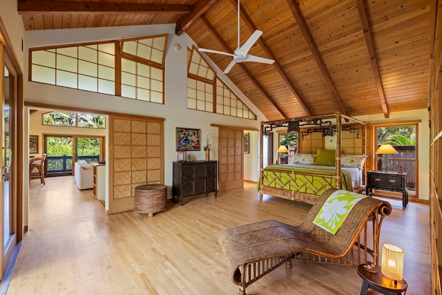 interior space featuring wood ceiling, high vaulted ceiling, beam ceiling, and light hardwood / wood-style flooring