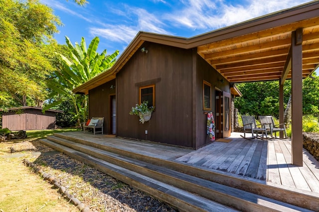 exterior space with a shed