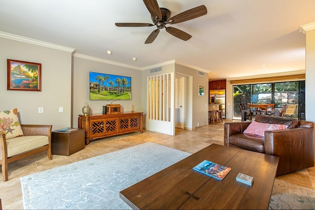 living room with ceiling fan and crown molding