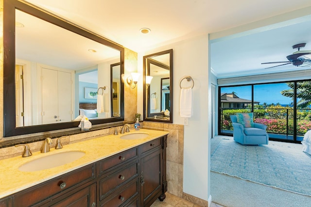 bathroom with vanity and ceiling fan