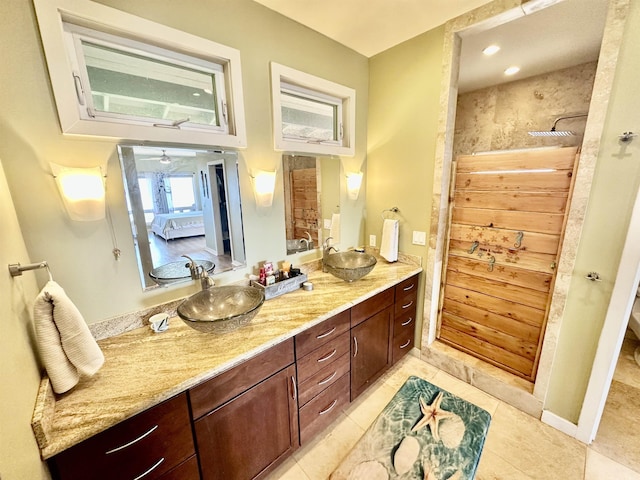 bathroom featuring vanity and tile patterned flooring