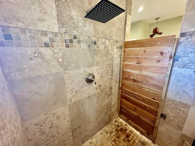 bathroom with tiled shower