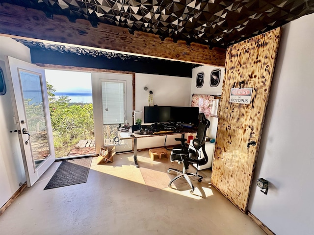 office area with concrete flooring