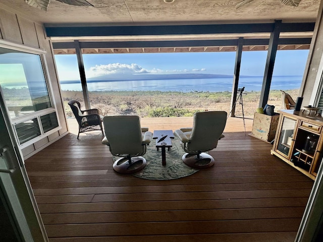 deck featuring a water view