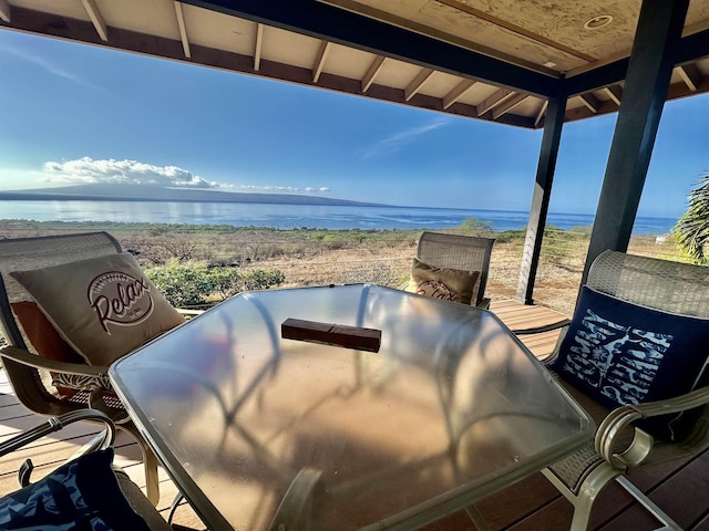 view of patio / terrace with a water view