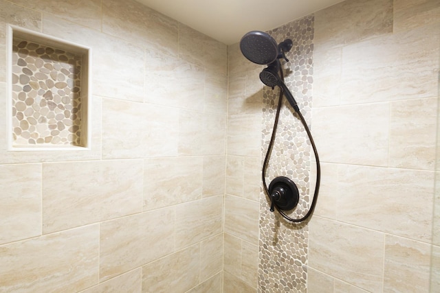 details featuring a tile shower