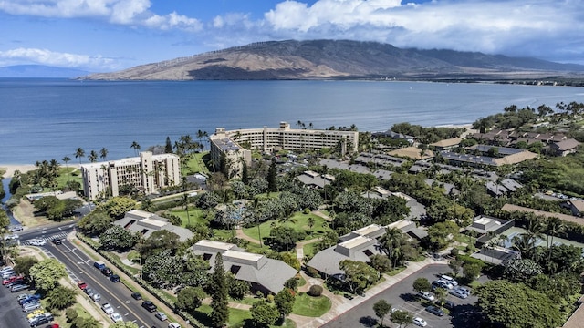 aerial view featuring a water and mountain view