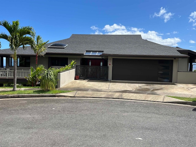 single story home featuring a garage