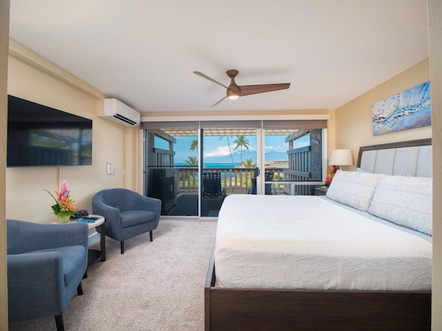 carpeted bedroom with ceiling fan, access to exterior, and a wall mounted AC