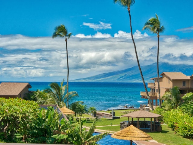 property view of water featuring a gazebo and a mountain view