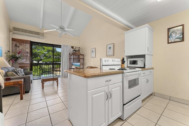 kitchen with white cabinetry, a wall mounted AC, lofted ceiling with beams, and white appliances