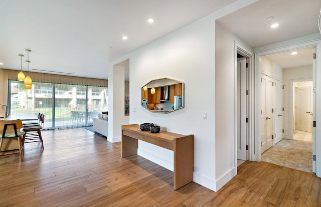 hall featuring light hardwood / wood-style flooring