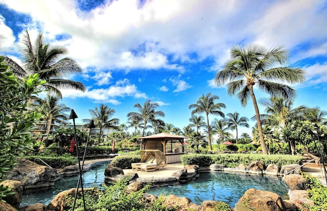 view of swimming pool with a gazebo