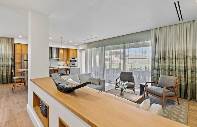 living room featuring light hardwood / wood-style flooring