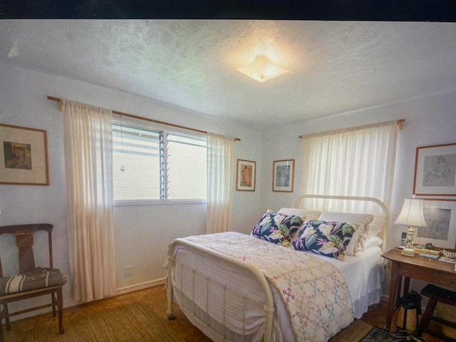 bedroom featuring a textured ceiling