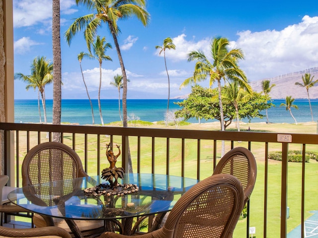 balcony featuring a water view