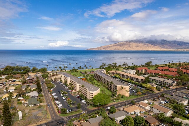 bird's eye view featuring a water and mountain view