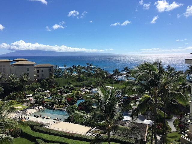 birds eye view of property featuring a water view