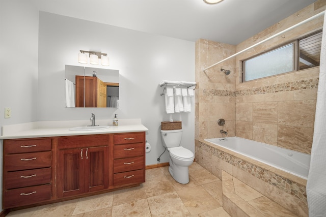 full bathroom with vanity, toilet, shower / bath combo with shower curtain, and a wealth of natural light