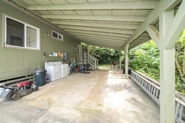 view of patio / terrace featuring washing machine and dryer