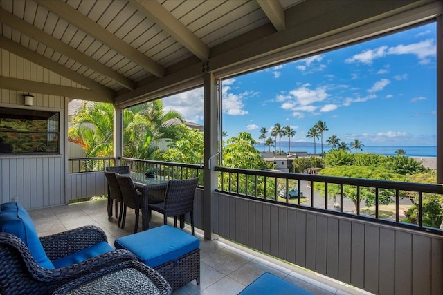 balcony featuring a water view