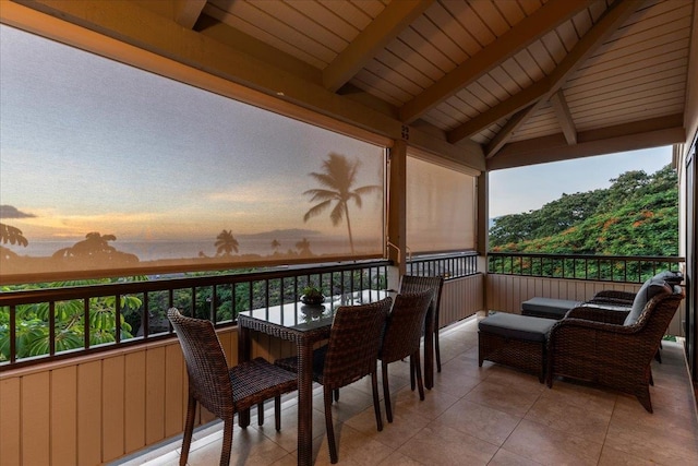 view of balcony at dusk