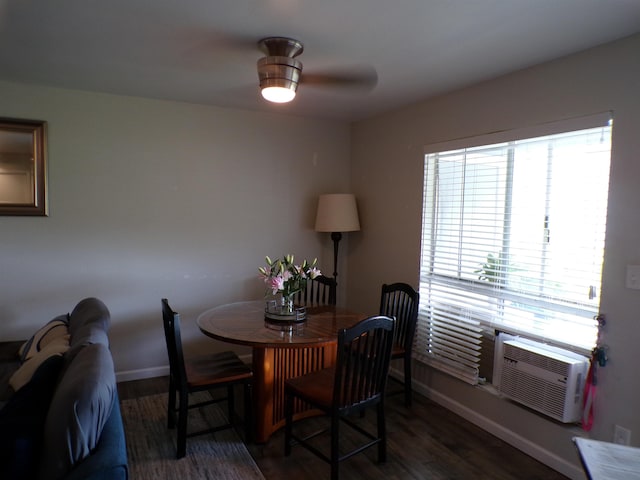 dining space with ceiling fan, cooling unit, and dark hardwood / wood-style floors