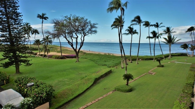 surrounding community featuring a water view