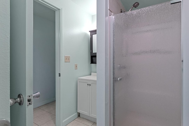 2747 S Kihei Rd Unit D102, Kihei, HI 96753 - bathroom with a stall shower, tile patterned flooring, and vanity