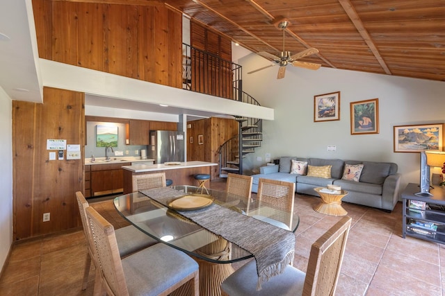 dining room with wooden ceiling, high vaulted ceiling, sink, light tile flooring, and ceiling fan