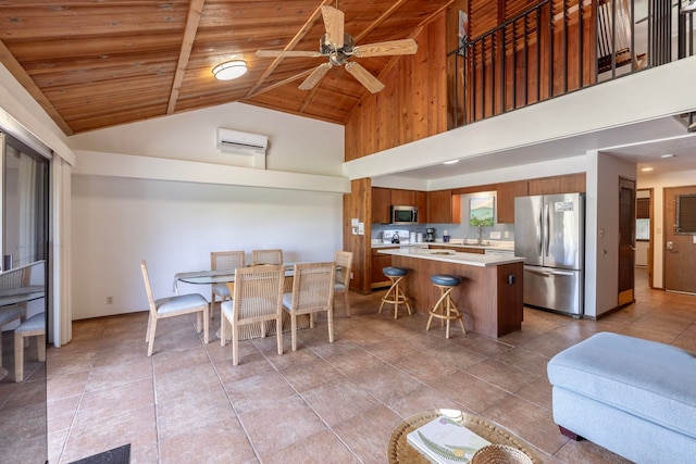 living room featuring high vaulted ceiling, light tile flooring, and wood ceiling