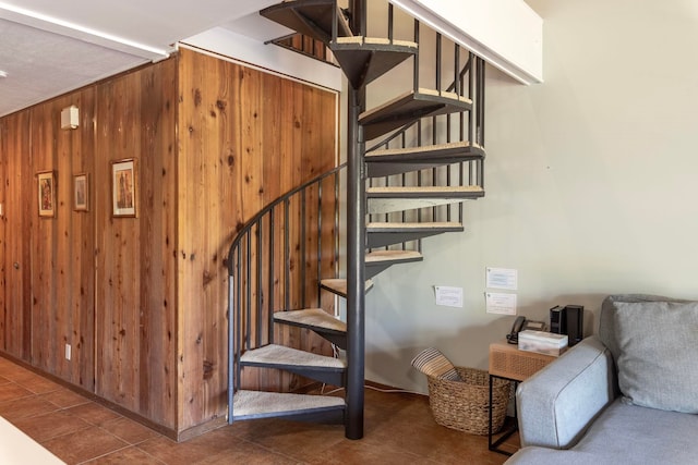 stairs featuring tile floors